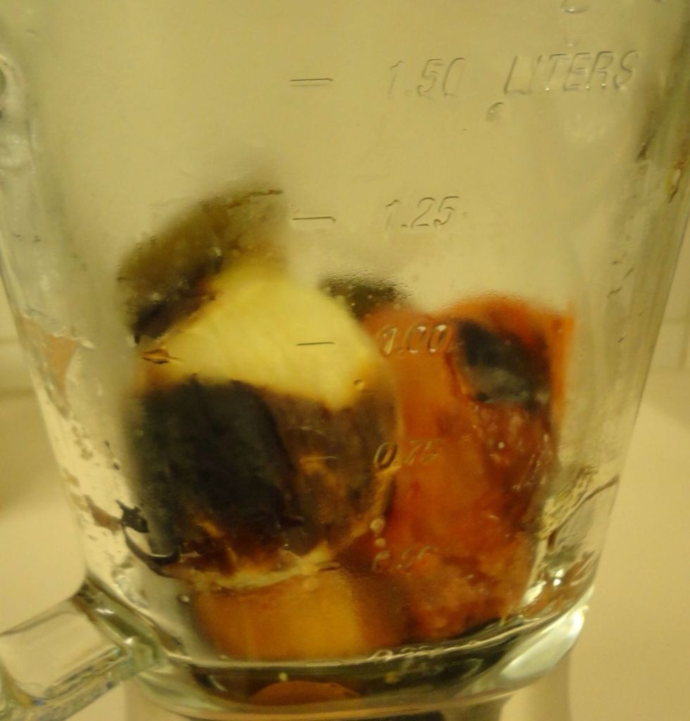 Transfer everything to our trusty blender. I don't have a Vitamix or a Blendtec (again, donations accepted!), but a $30 Oster does the job.