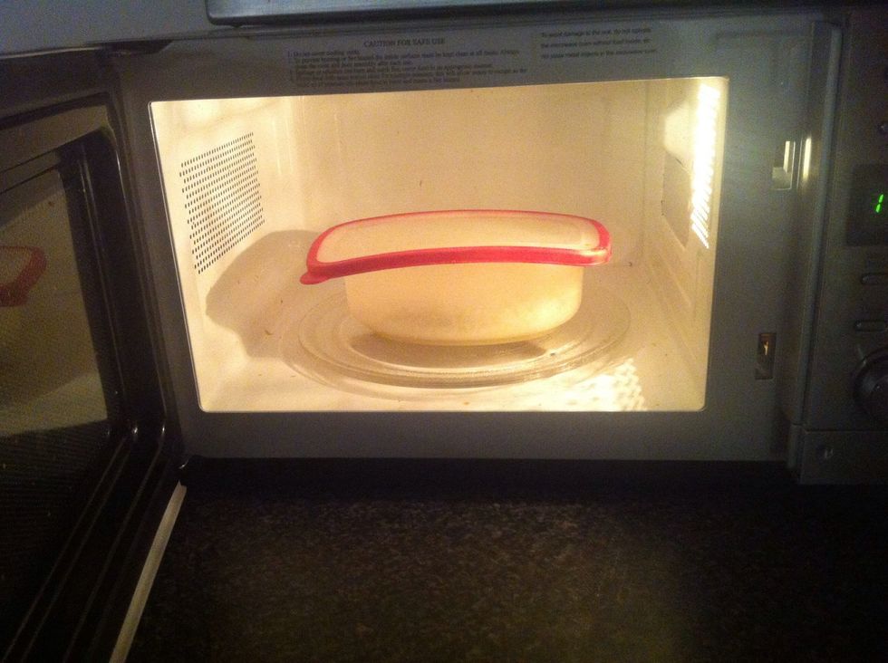 Transfer into a microwaveable container, cover loosely and place inside the microwave.