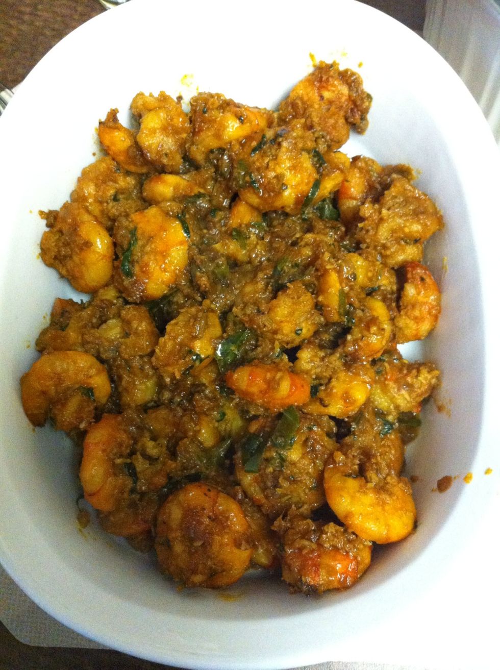 Transfer into your serving bowl and enjoy the hot spicy Indian styled shrimp.
