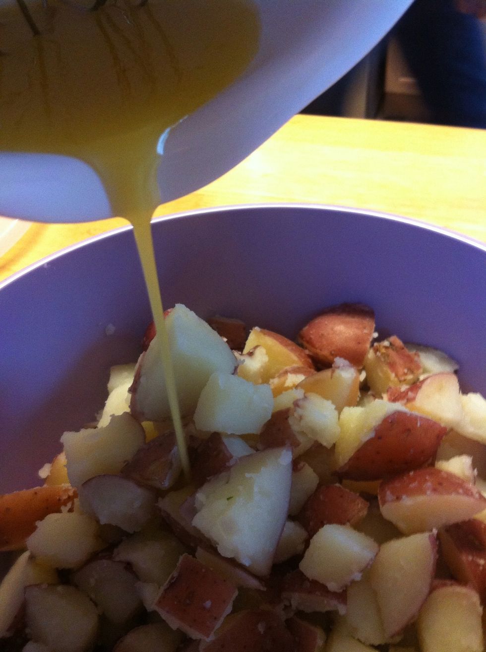 Transfer potatoes to a bowl, and drizzle with vinaigrette.