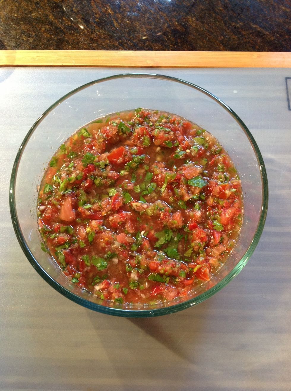 Transfer salsa to non-reactive container (I prefer glass) and refrigerate allowing the flavors to meld. About 1 hour