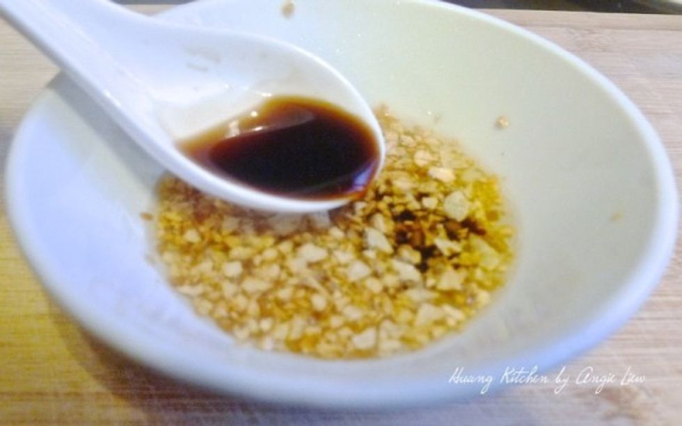 Transfer the browned garlic, ginger and the fragrant oil into a small bowl. Then add a tablespoon of good quality soy sauce & mix everything together. This forms a simple but full of aroma sauce.