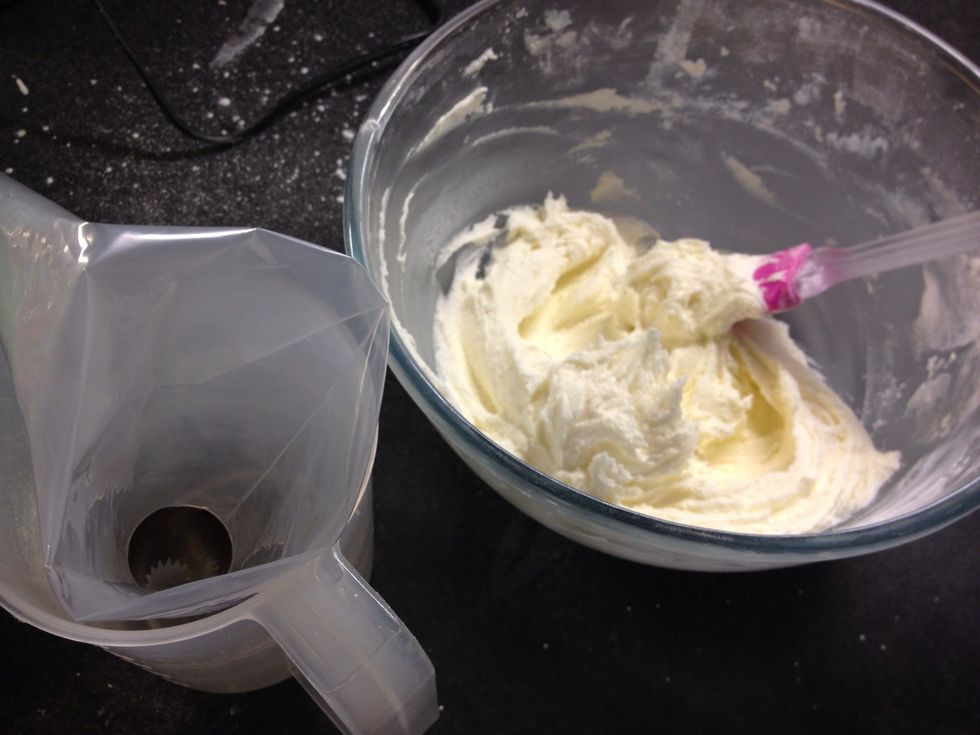 Transfer the buttercream to a piping bag...