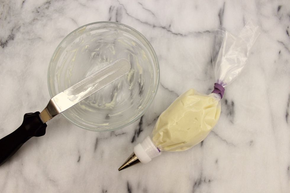 Transfer the decorative icing into a prepared piping bag with a #3 round tip.