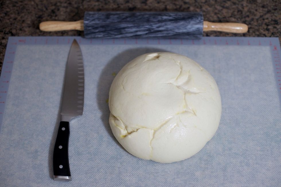 Transfer the dough onto the silicone mat.  It should be a big airy lump.