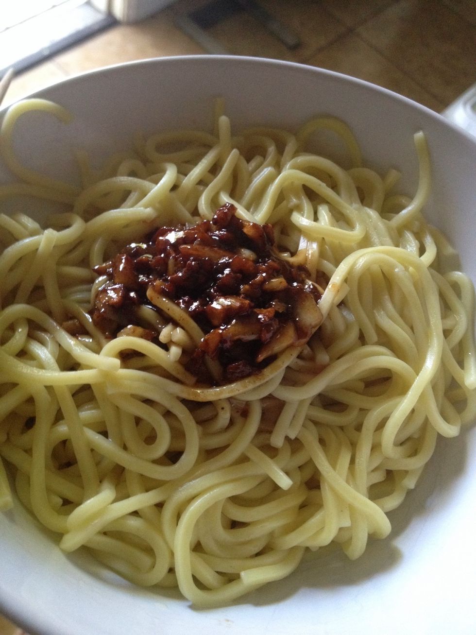 Transfer the garlic sauce on top of noodles. To serve, just toss all the noodles with the garlic sauce. Add the cheese, toss to combine well. Serve immediately.
