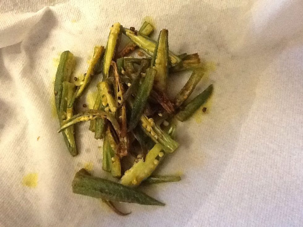 Transfer the lot to paper towel to strain.