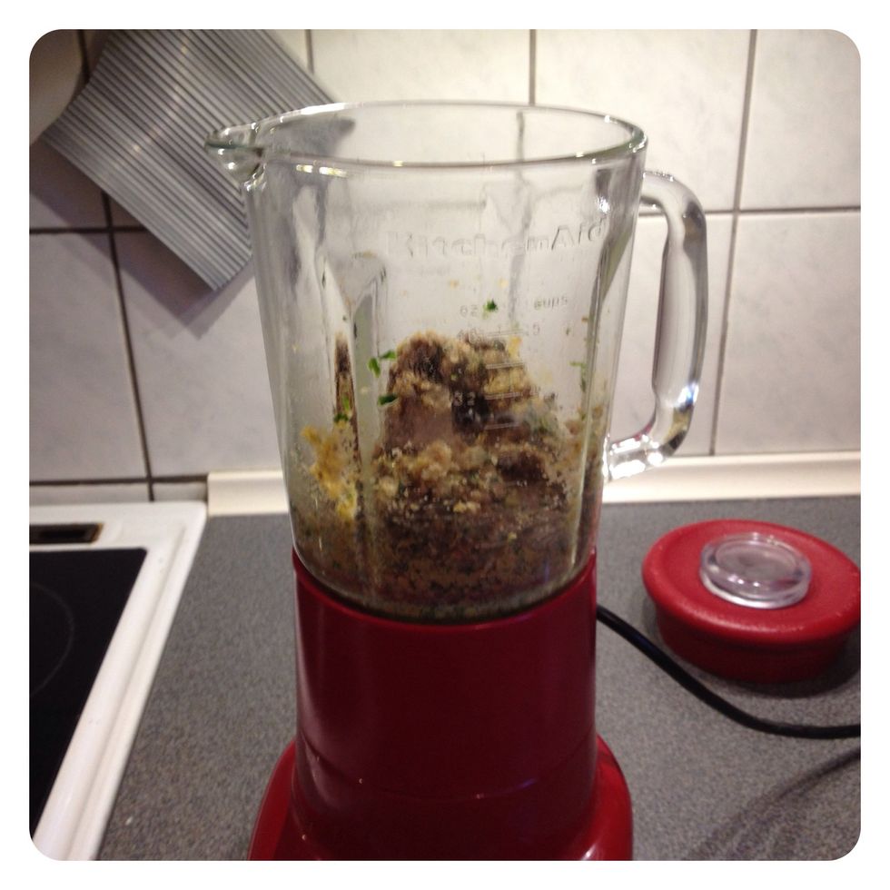 Transfer the mixture into a blender, mix it with Grana Padano cheese, eggs, crumbled macaroons, raisins, salt, pepper, bread crumbs little at a time, the mixture should be soft and not too wet