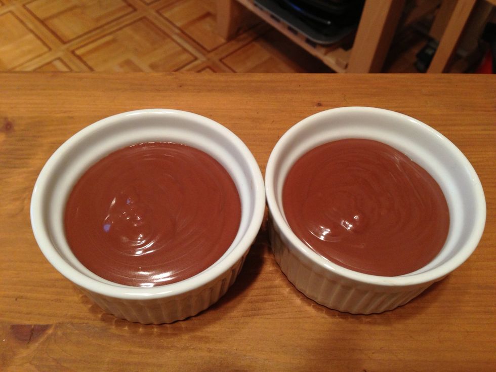 Transfer the pudding into a measuring cup with a spout and then pour into individual bowls.