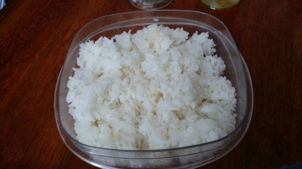 Transfer the rice from the pot to a bowl or container. Let the rice cool for about 5 minutes.