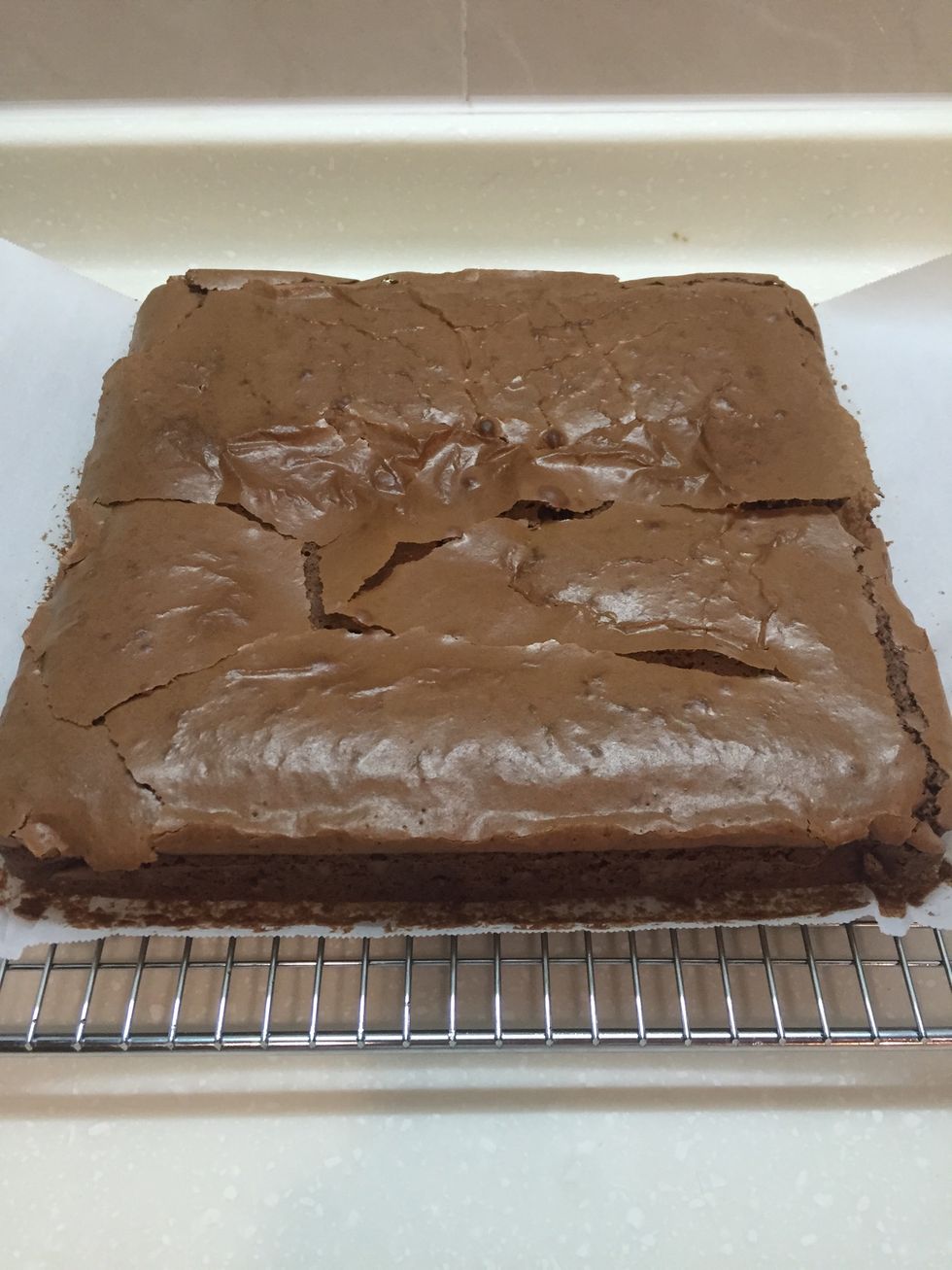 Transfer to a baking rack and let the cake continue to cool.