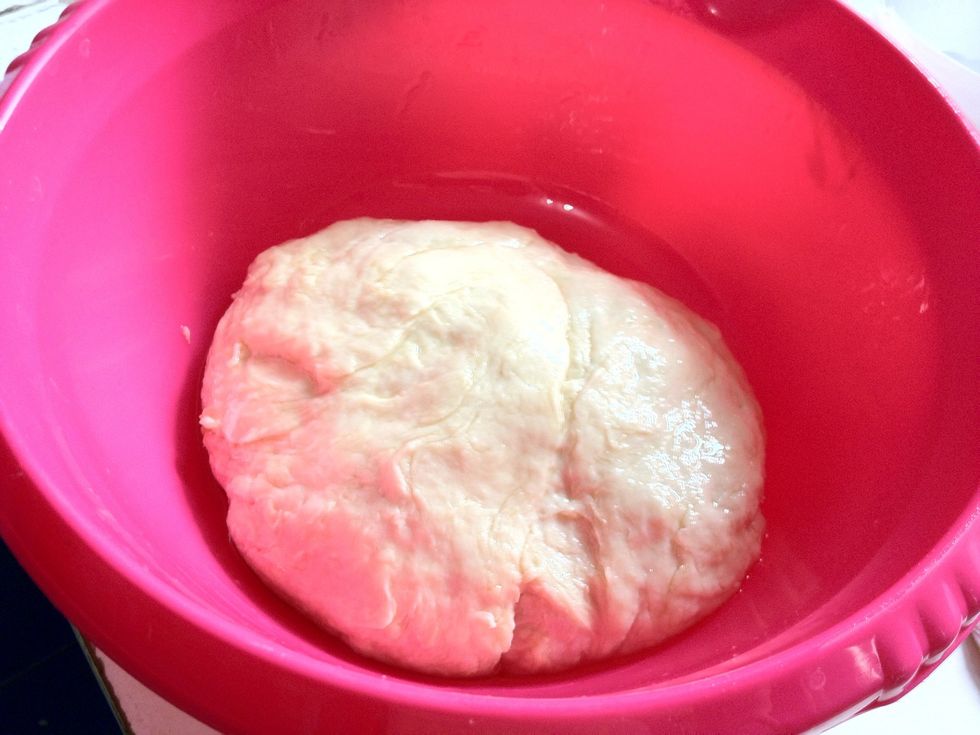 Transfer to a bowl which has been rubbed with some oil. Rub the dough with little bit of oil to prevent crack. Let the dough rest for at least 30 mnts