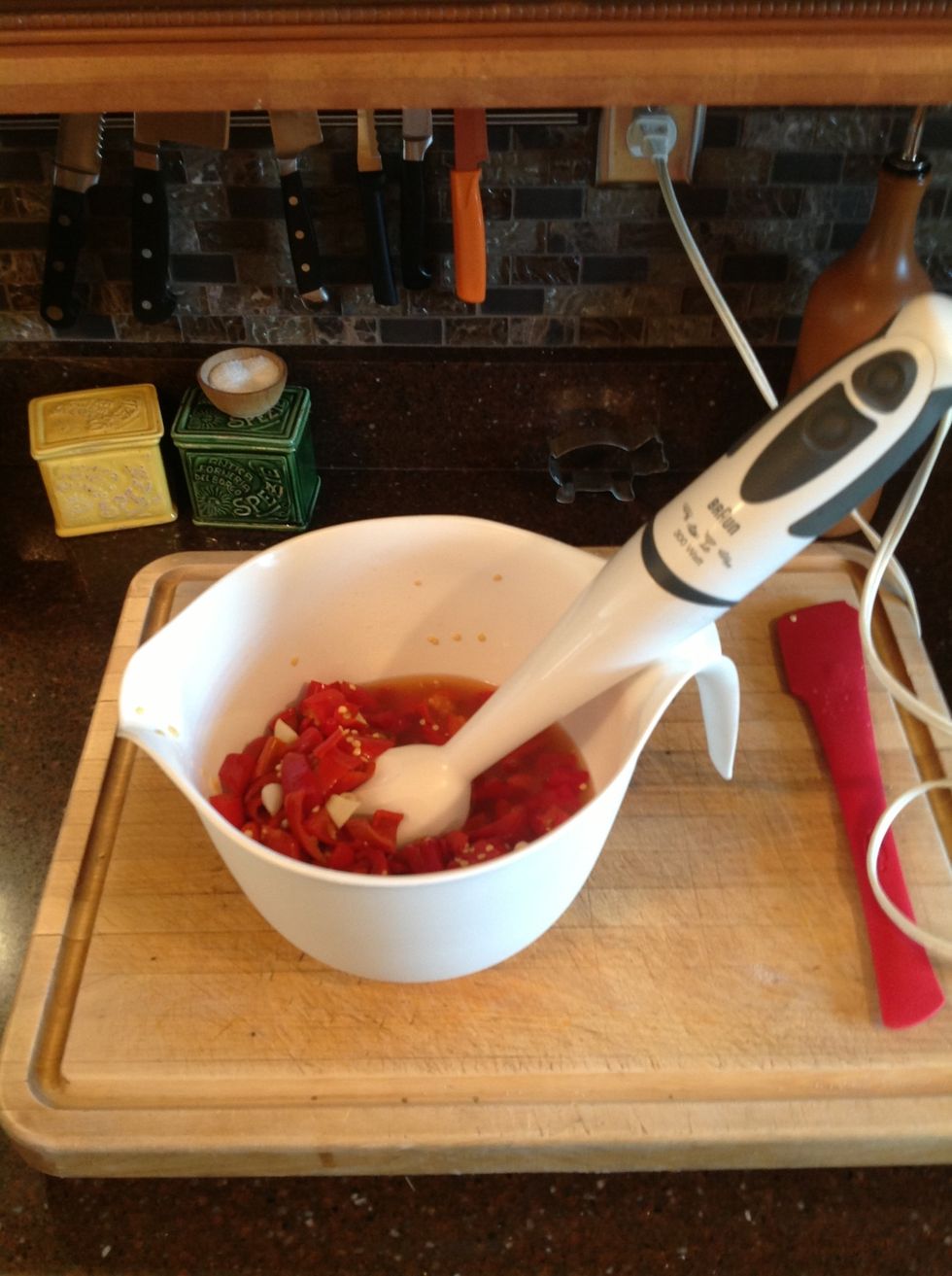 Transfer to a food processor or bowl and use a stick blender. pur\u00e9e for 5 min or until a smooth, orange-red mixture forms.