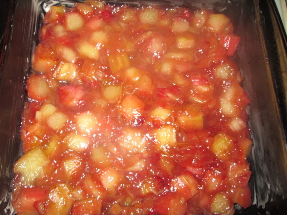 Transfer to a greased 9 inch square baking dish