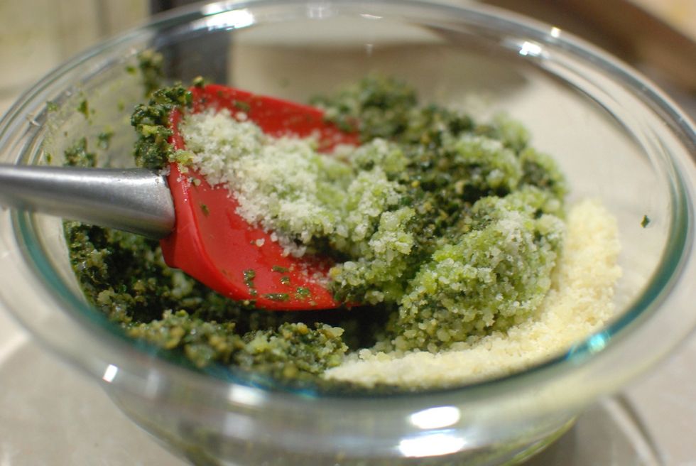 Transfer to a small bowl and stir in 1/3 cup of freshly grated parmigiano reggiano plus 3 tablespoons of freshly grated pecorino Romano.