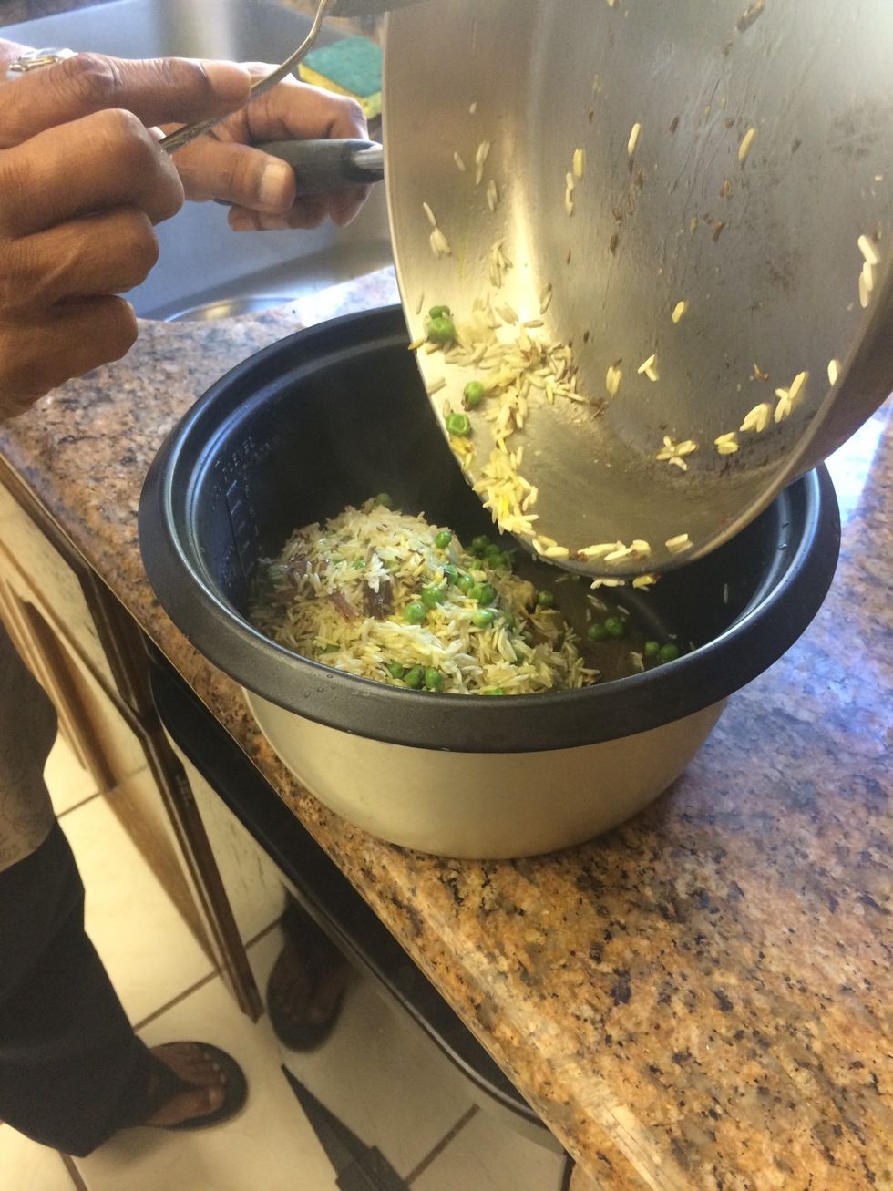 Transfer to rice cooker and add 2 and 1/4 cup of water