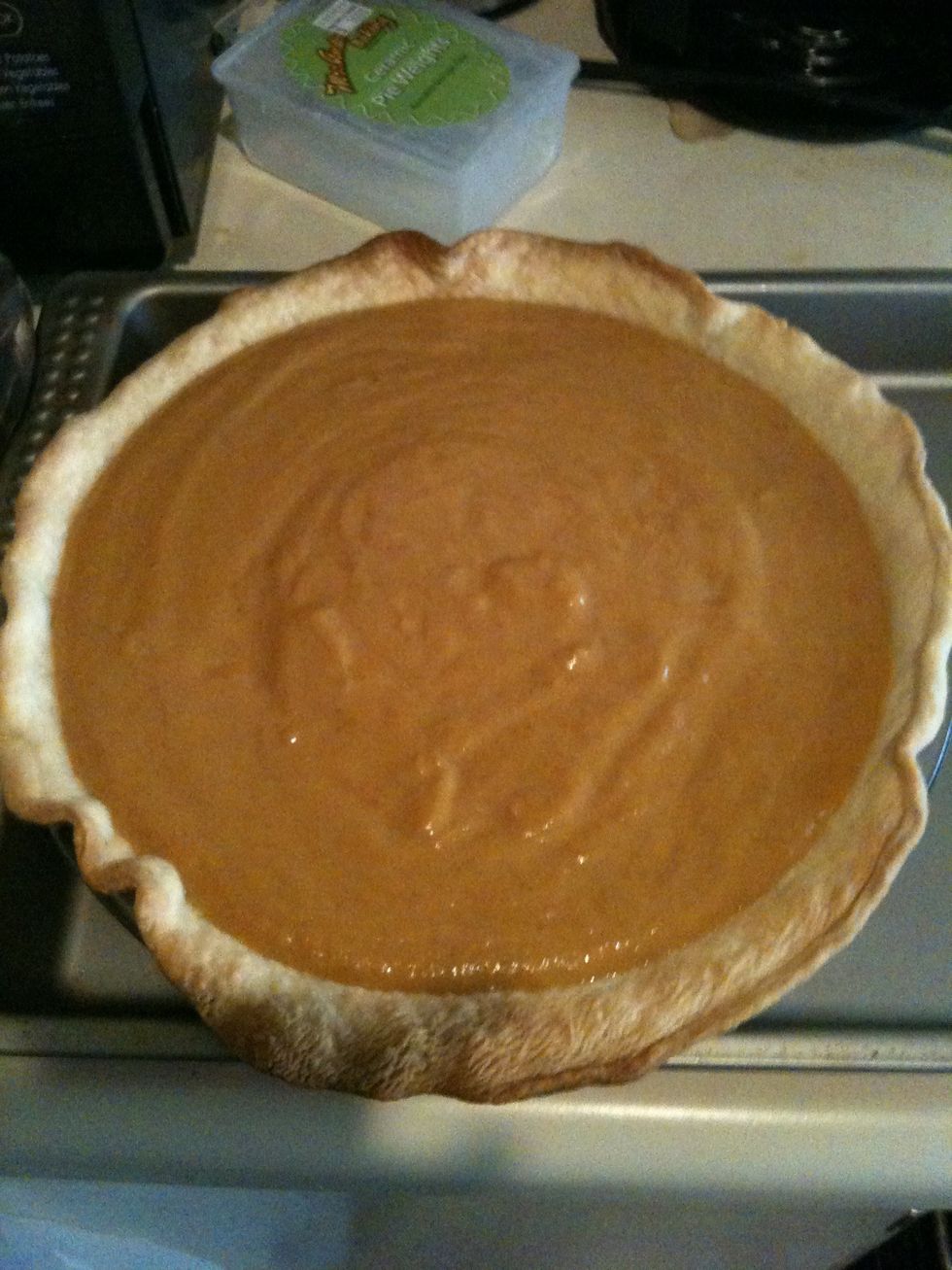transfer to warm pie shell. bake pie at 400f for 10 min. Reduce heat to 300f and continue baking until edges of pie are set 20 to 35 minutes longer. (My pretty edges of pie dough were squashed by foil