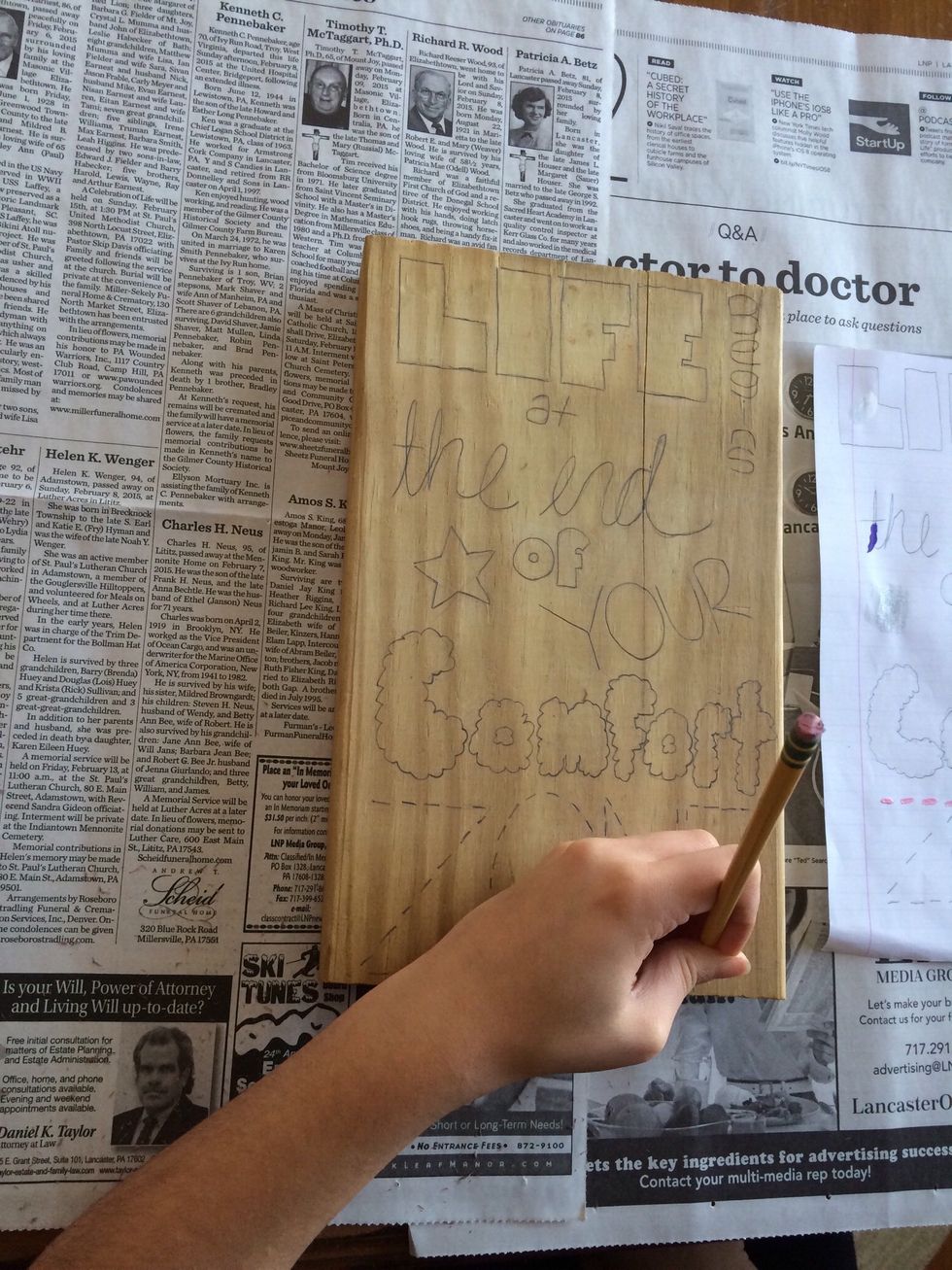 Transfer your sketch on to the piece of wood. If you plan on having a solid background, paint that before you sketch your design.