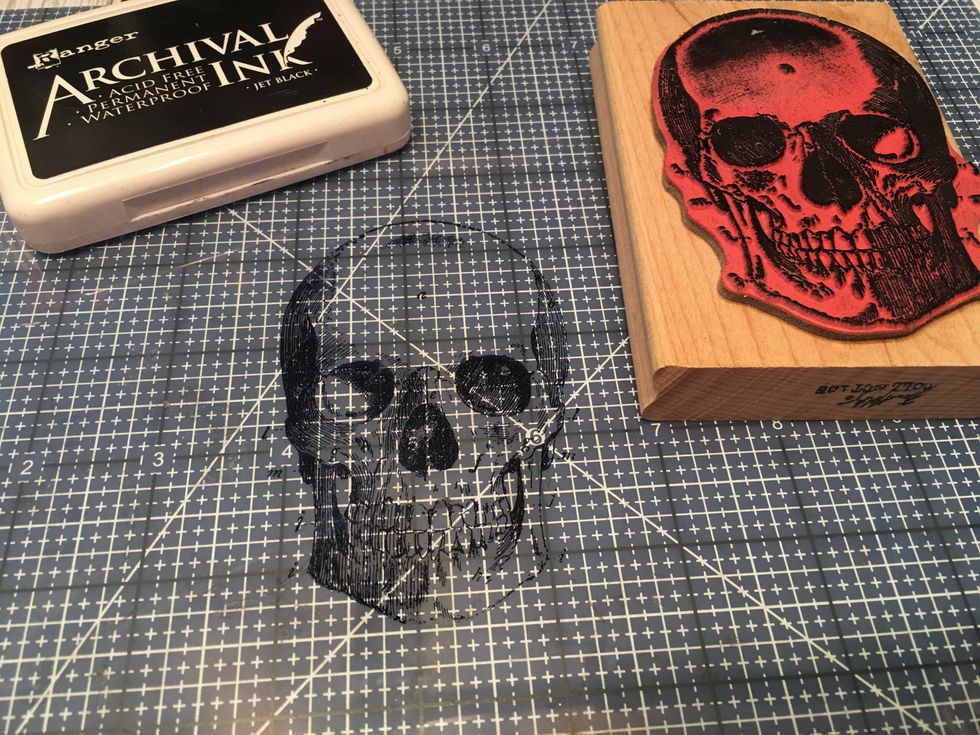 Transparent Pocket:  Cut transparency sheet to 7" wide x 7 1/2" tall.  use ARCHIVAL black ink to stamp an image onto the transparency sheet.  Allow to dry before touching or adding into your album.