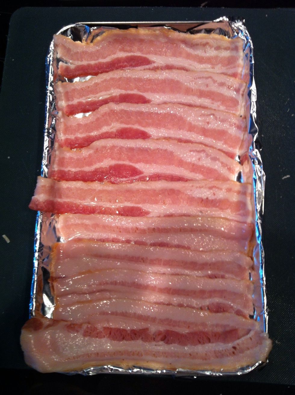 Tray up ur bacon put them in the oven for 5 min (depend on ur oven) then flip continue till crispy
