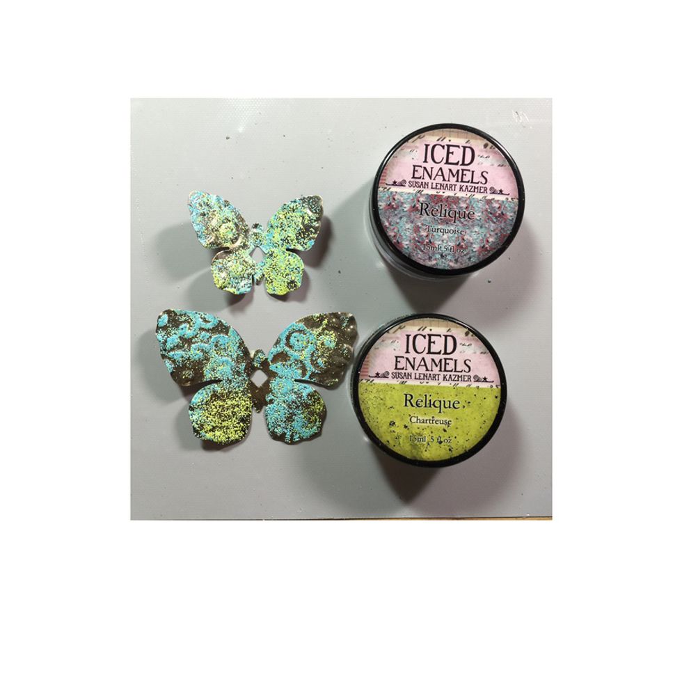 Treat with the embossing powders to finish off for a great texture.