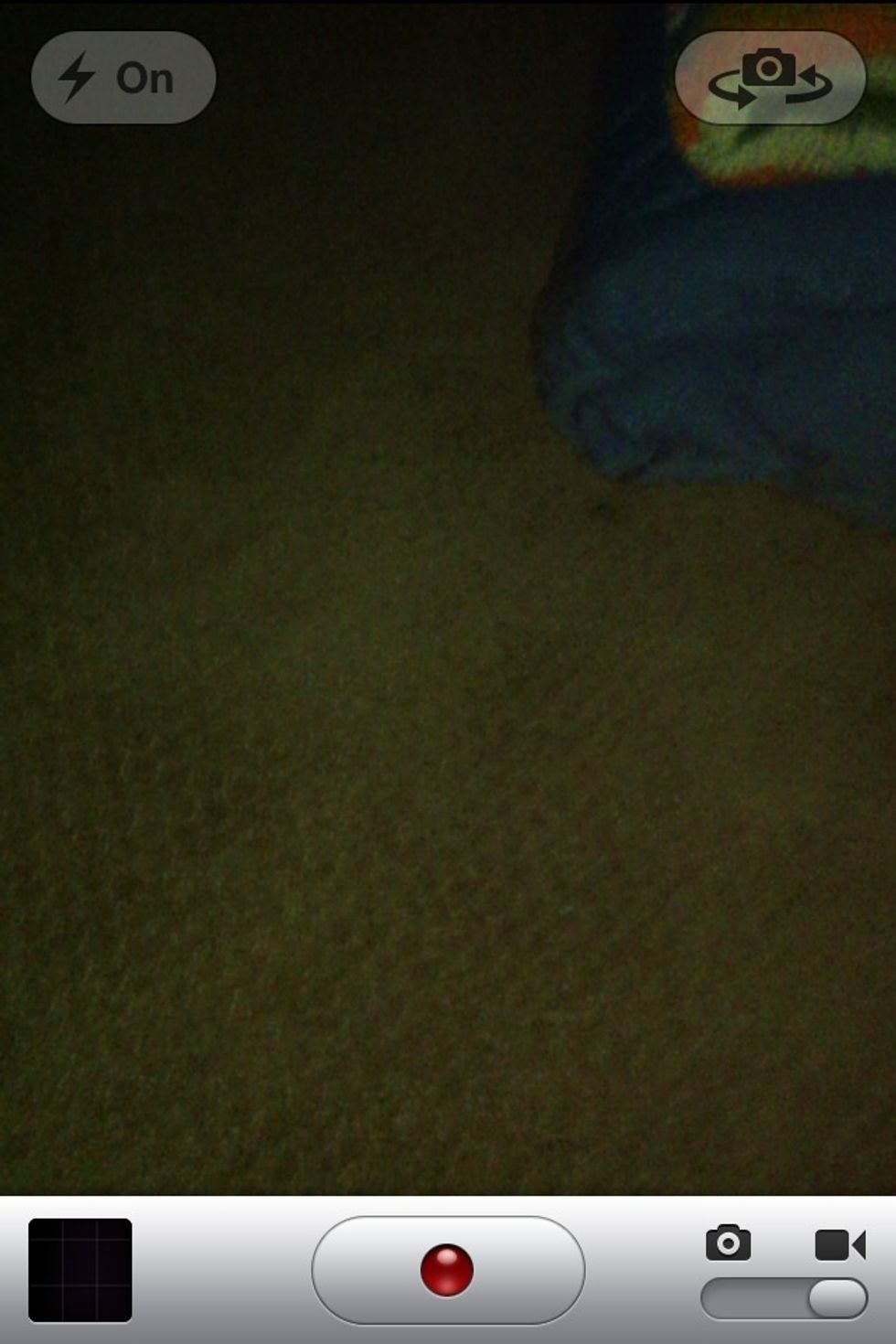 Trick 1) Switch over to the video part of your phone and in the top right corner click the "Auto" button and click on "On." Now you have a quickly accessible flashlight!