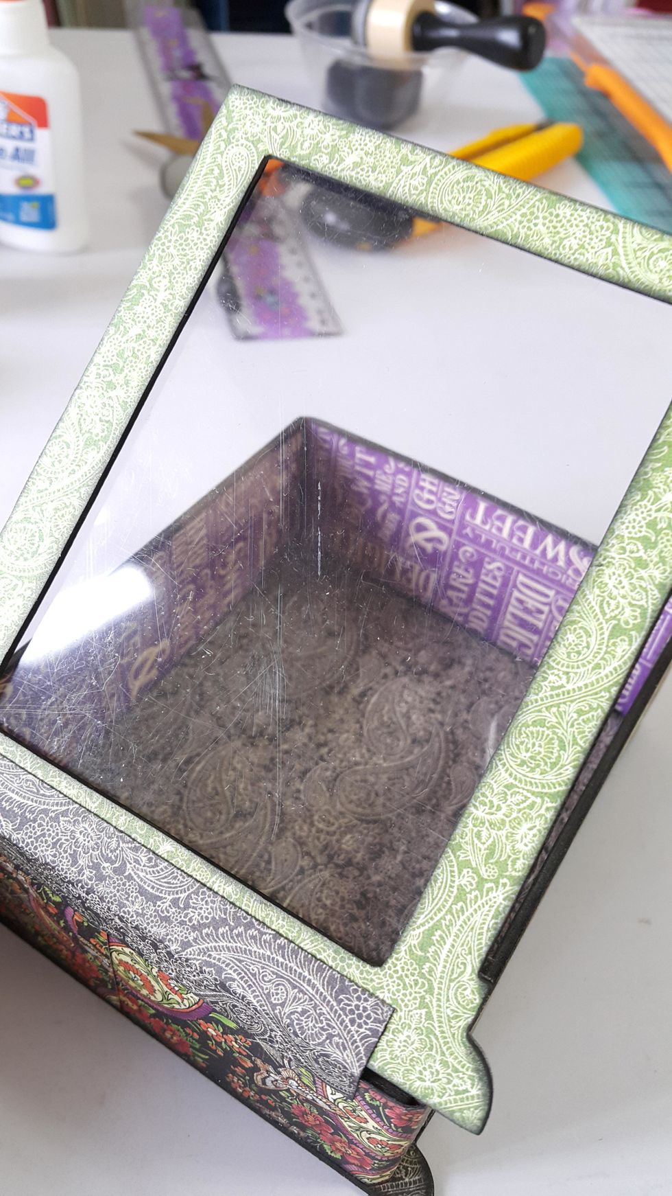 Trim 2pcs acetate to size, adhere only 3 sides of the second acetate, leave one side for photos to sleeve in