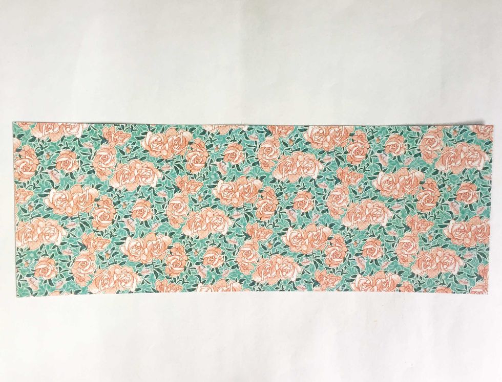 Trim a 3.5" wide of strip from the pattern paper of your choice.