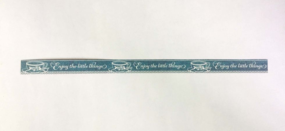 Trim a strip of your choice from the paper selection.