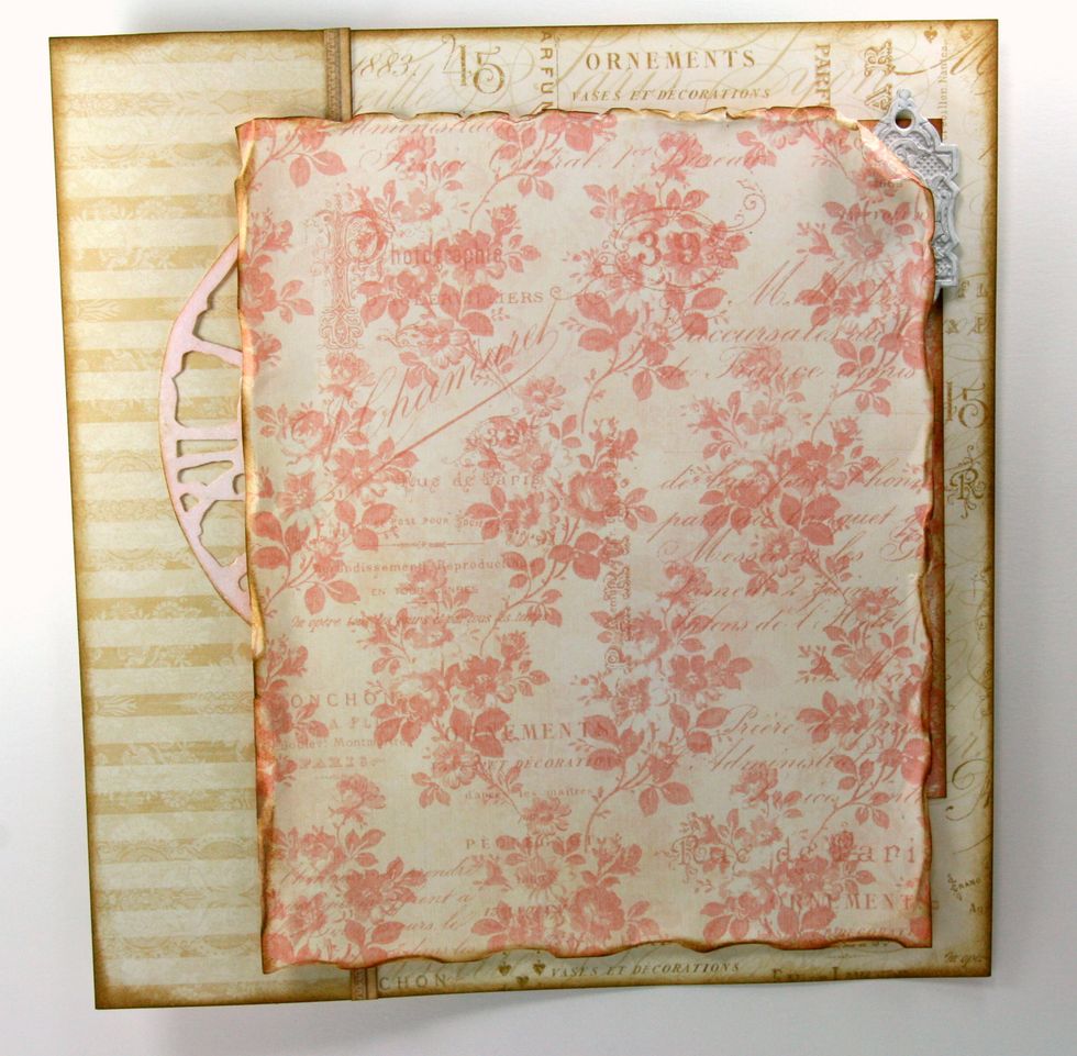 Trim additional block of patterned paper from G45 Golden age using the reverse side this time. Scrunch up all edges heavily and ink all sides. Attach so Key Hole is just peeking out.