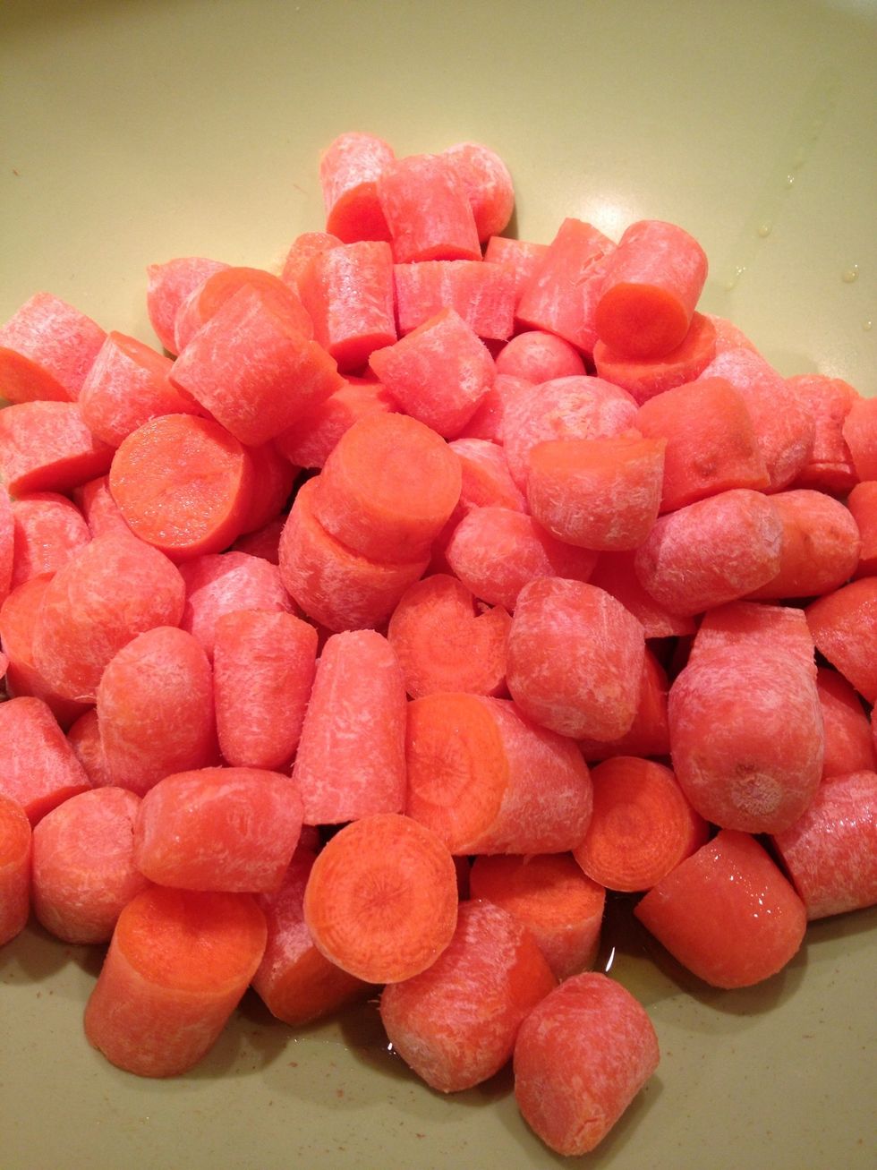 Trim and scrub the carrots. Cut into 1/4 inch chunks.