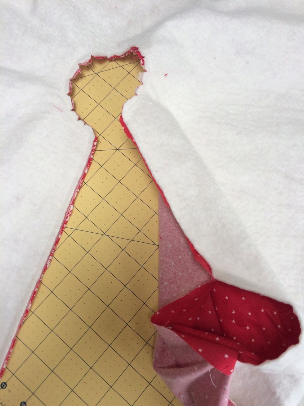 Trim excess and make notches in neck before turning right side out through the 6 inch gap