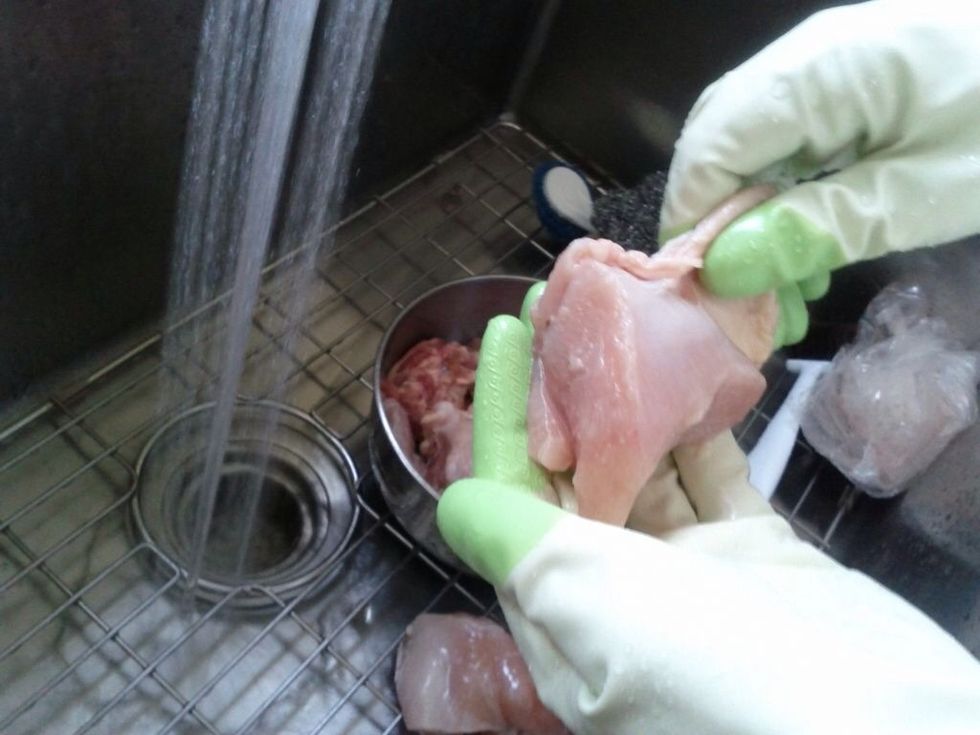 Trim fat and skin as much as possible. Then wash chicken pieces with salt and white vinegar. Rinse and then wash again. Do final rinse.