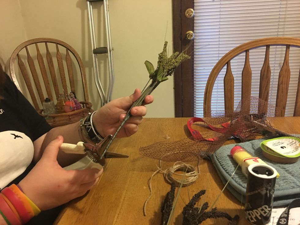 Trim fillers to fit into vase.