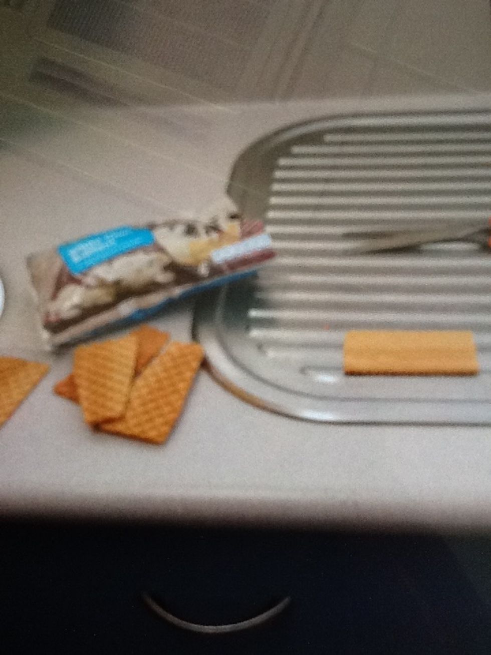 Trim ice cream wafers (may need a few spares)  so that one end has its corners trimmed