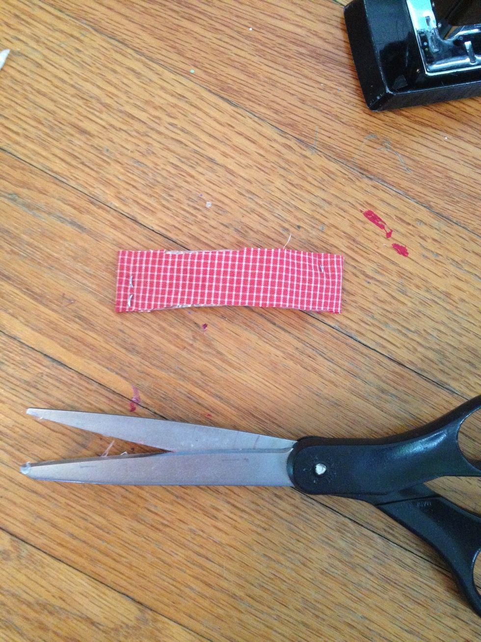 Trim it down, make it thinner and shorter. This is our first red tape shape.