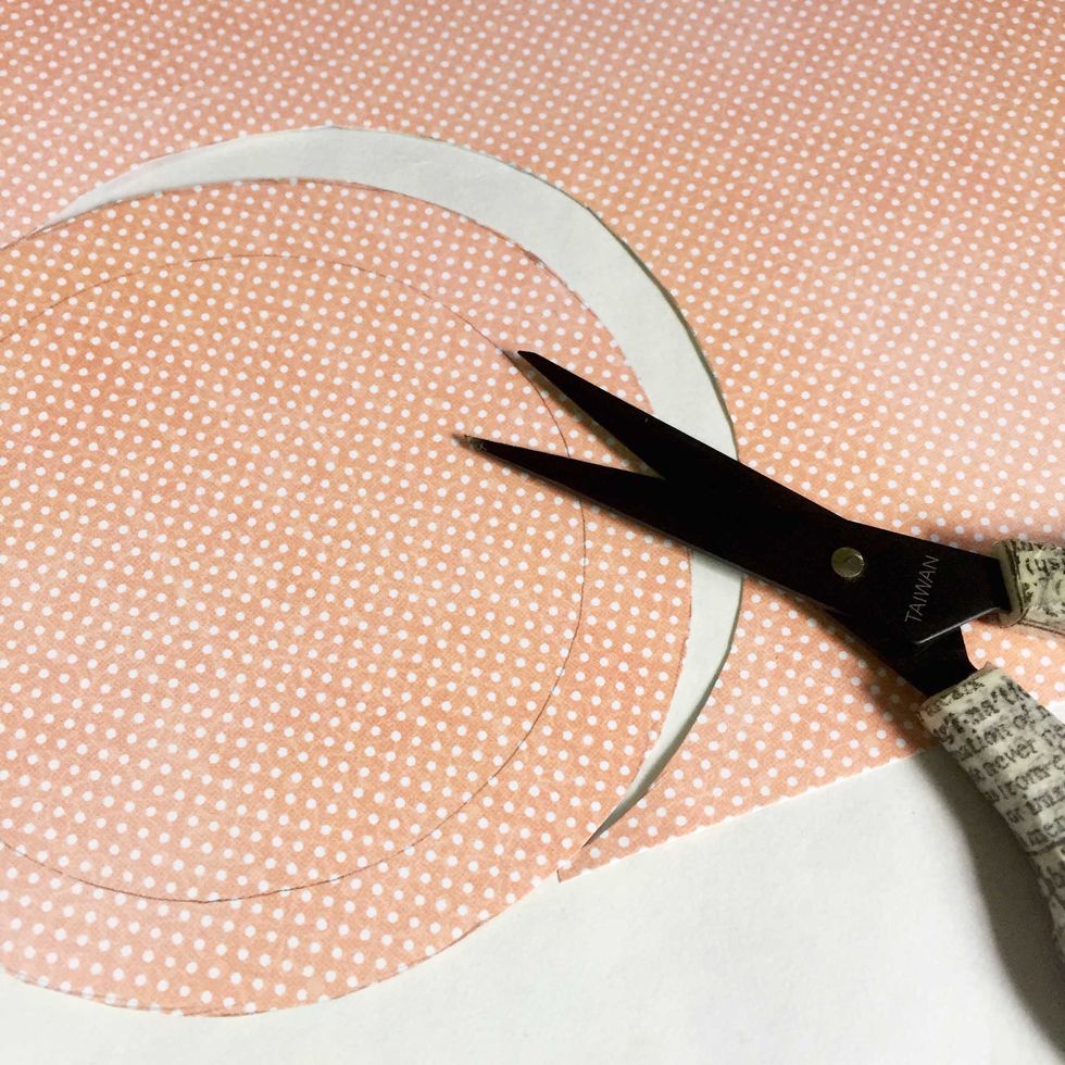 Trim it out using a precision scissors.
