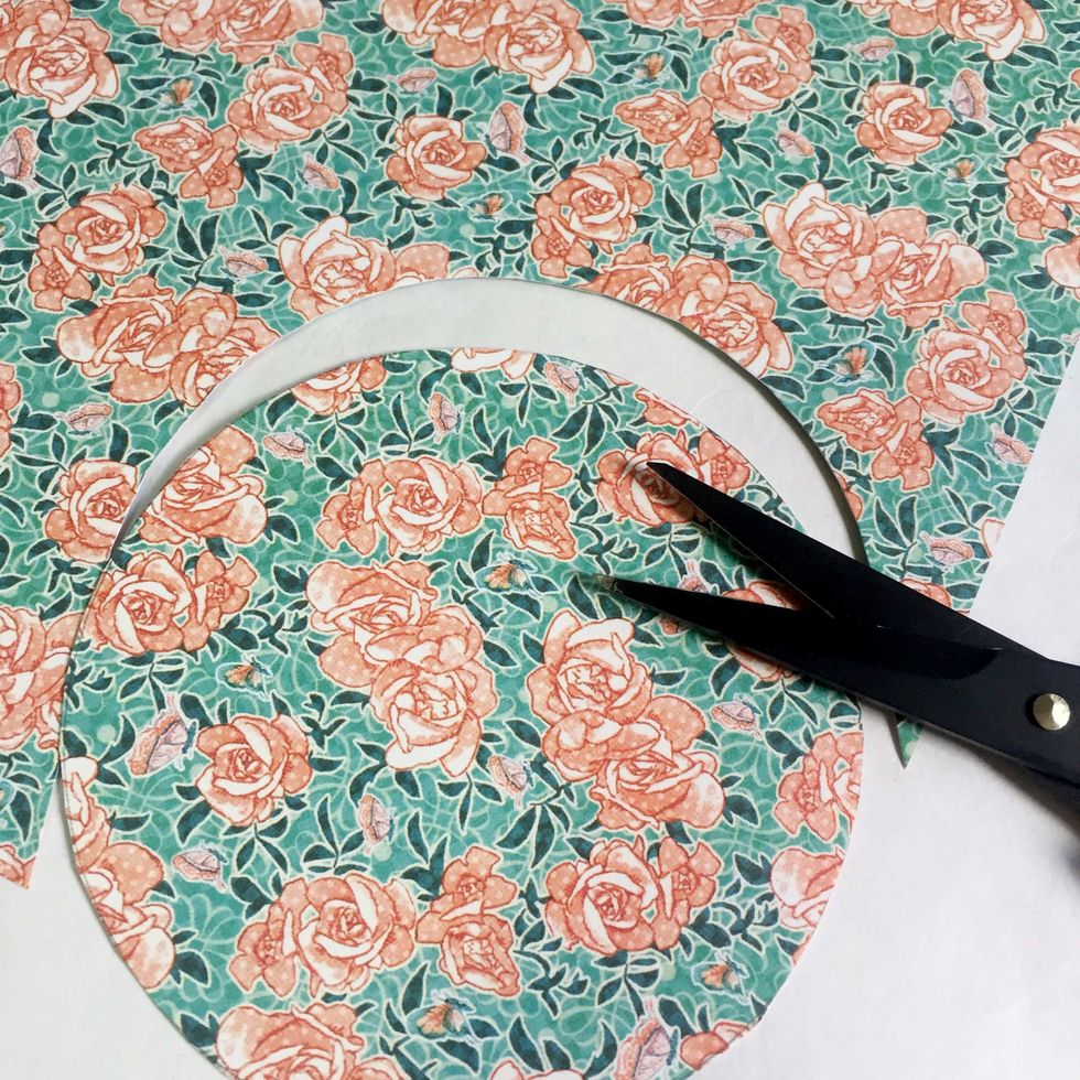 Trim it out using a precision scissors.