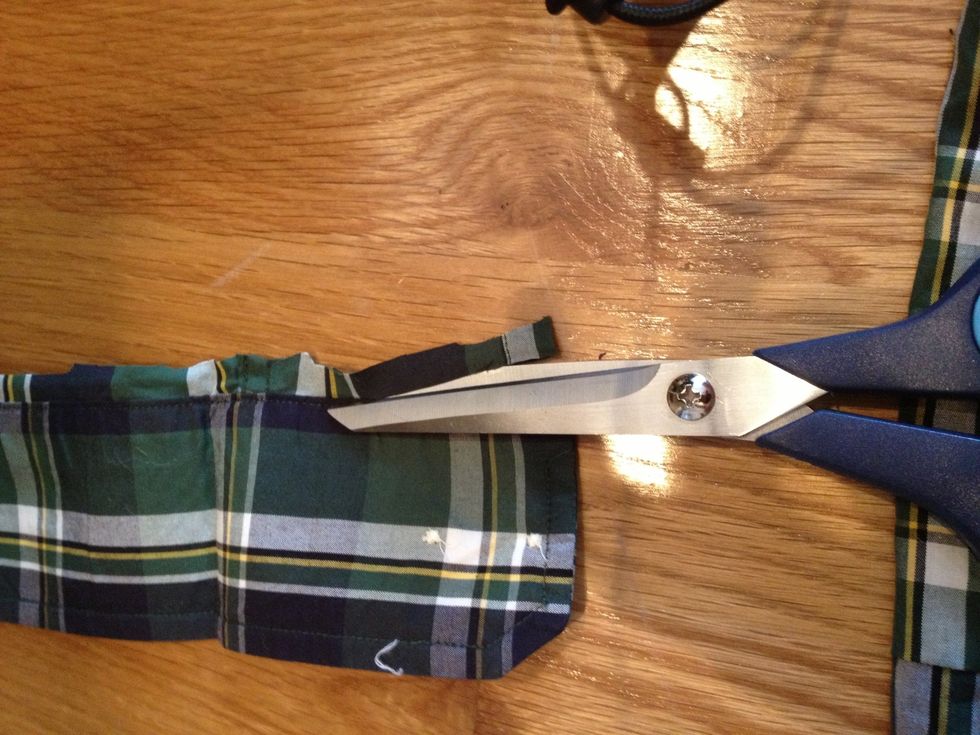 Trim off extra fabric from cuff.
