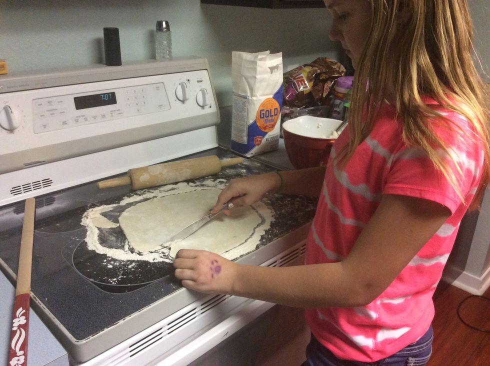 Trim off rough edges of lefse