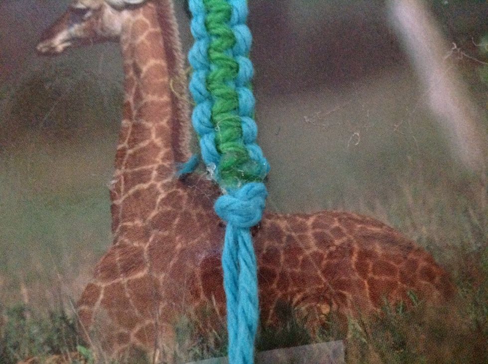 Trim off the extra yarn and tie a knot in the remaining base yarn.