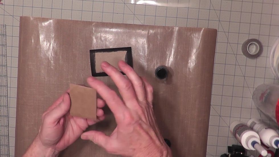 Trim ONE tube down to 2 inches wide. Keep the width the same as the other tubes with the folds at the top. This will be your spine piece of your album.