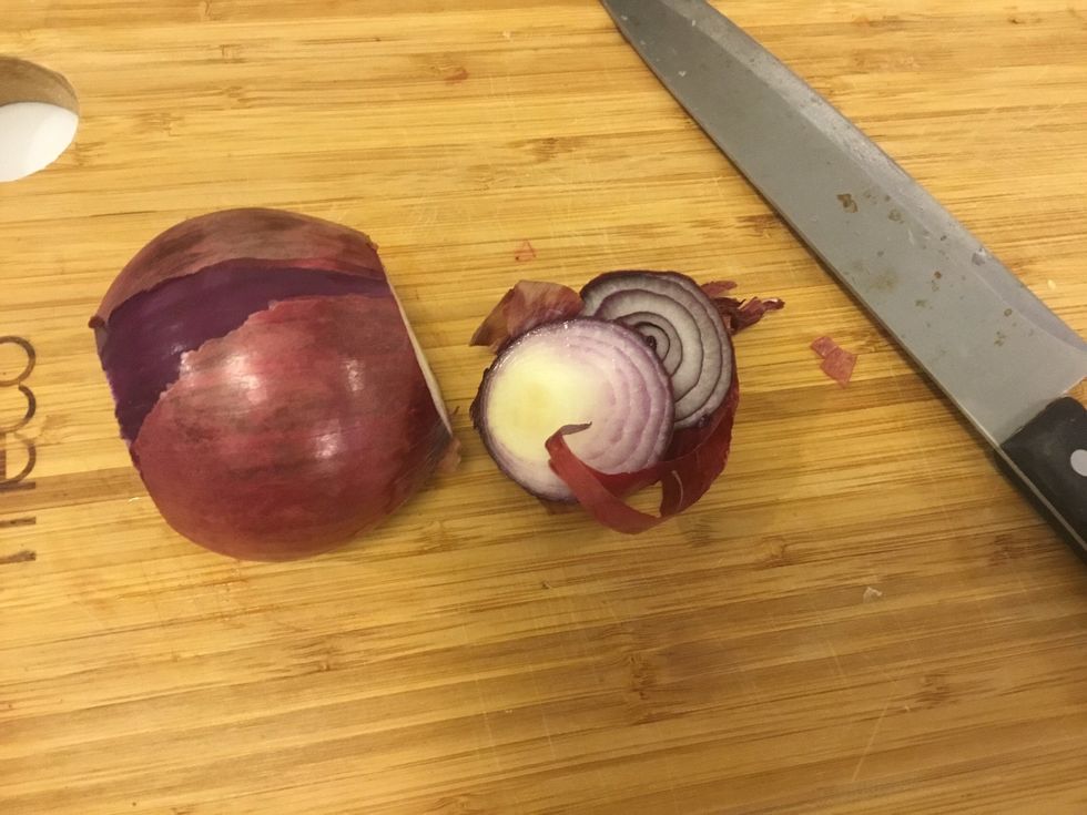 Trim Onion and discard outer shell.