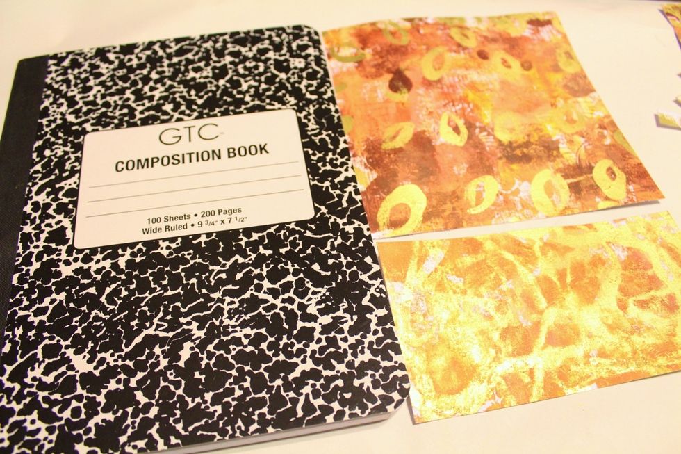 trim papers to fit composition book...