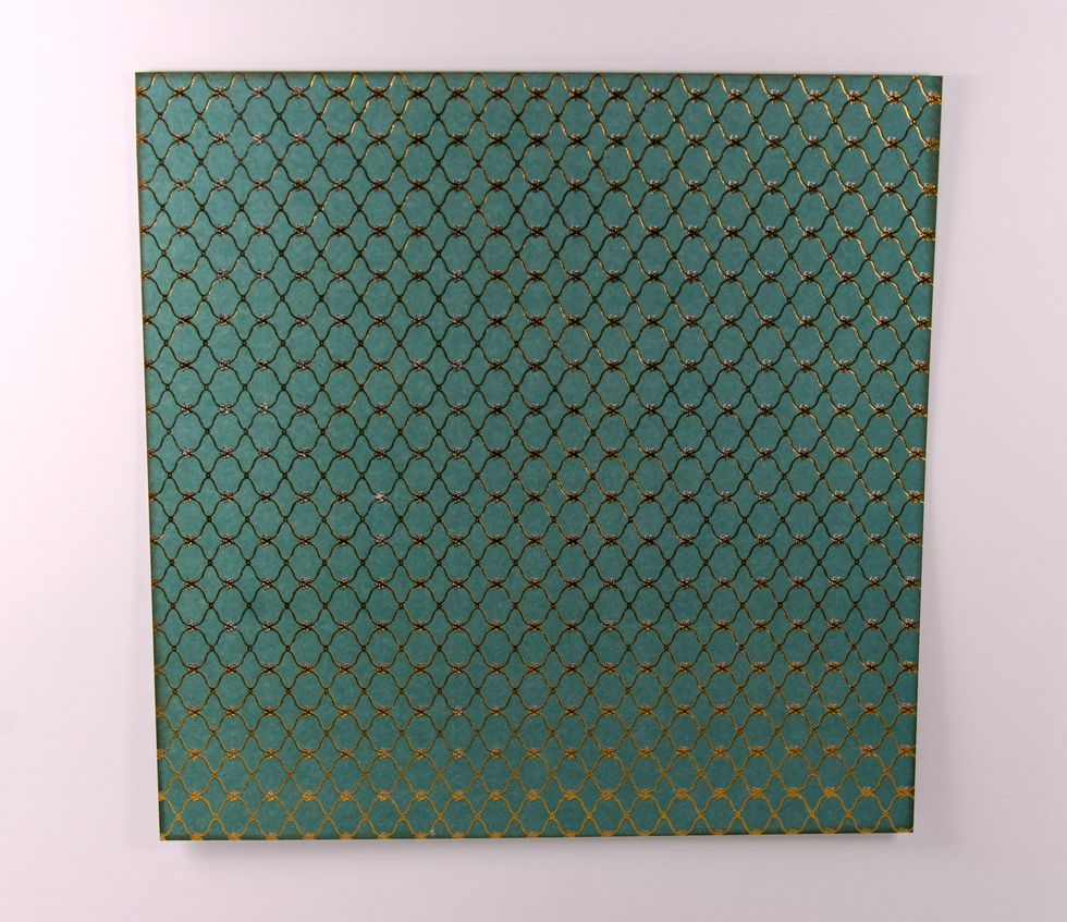 Trim patterned paper from  pad to 5 3/4 x 5 3/4 inches. Ink edges well.