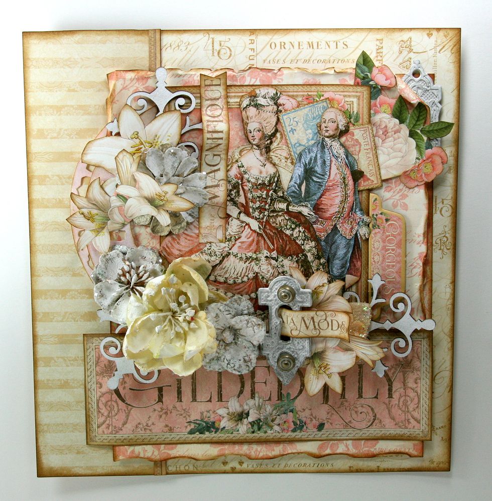 Trim small text image from G45 Her Majesty and tuck into center of painted Key Hole. Add Metal Staples Shabby Chic Ornate Brads.  Ad this to floral section and curve paper for extra dimension.