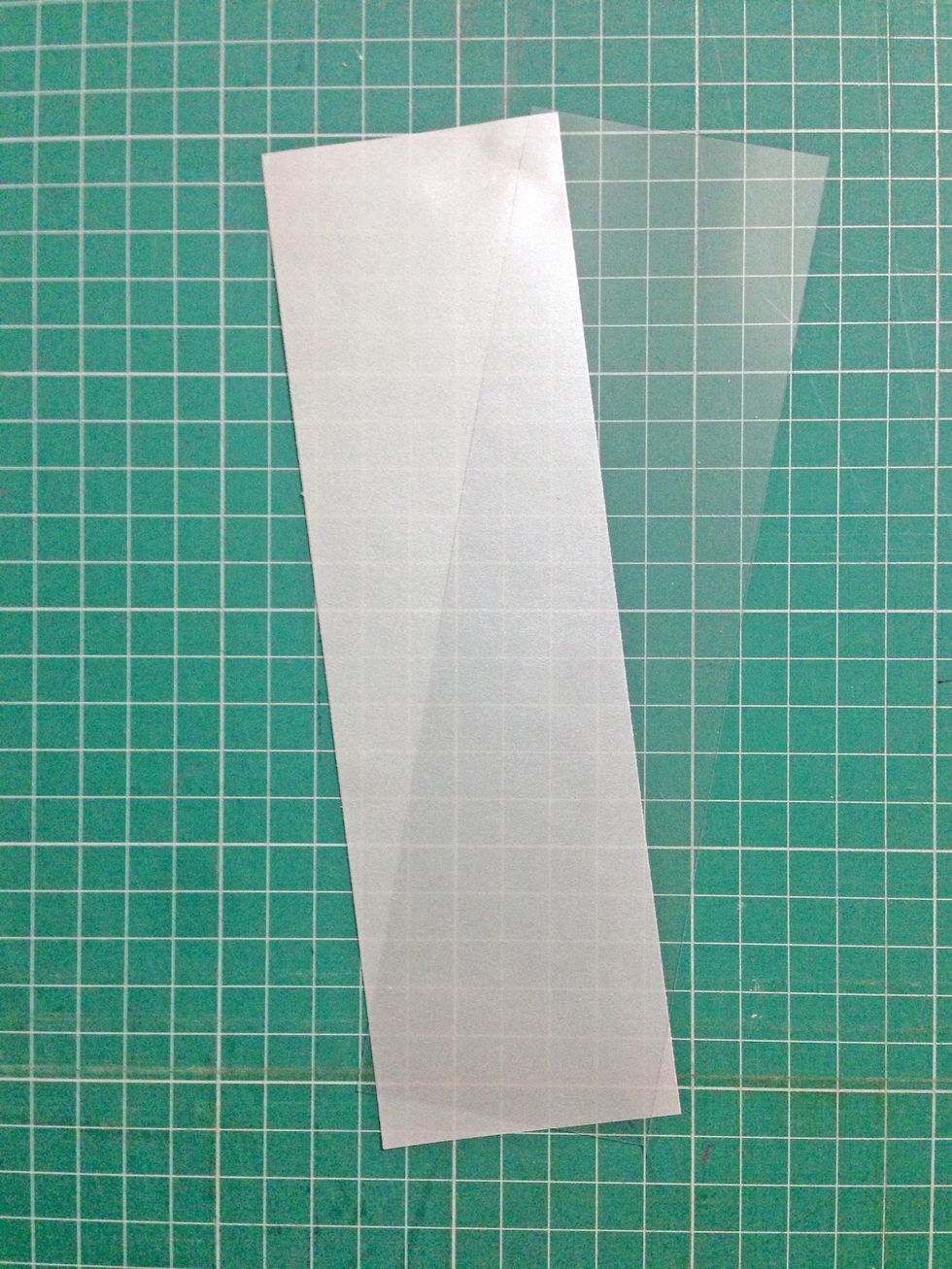 Trim strips of 2.25" by 3.25" of acetate sheet and tracing/vellum paper...