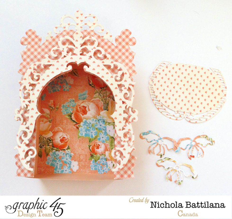 Trim the centre shape from previous die cut piece to fit the 'floor' of the box. Cut additional decorative pieces for embellishments.