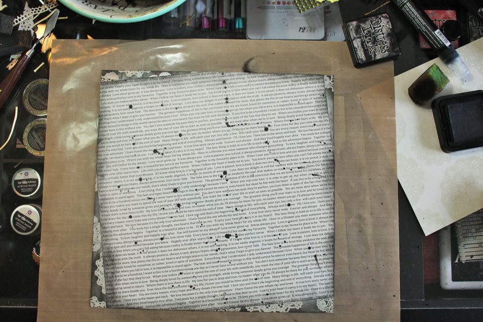 Trim the edges that are hanging off and ink the edges with black Distress ink.