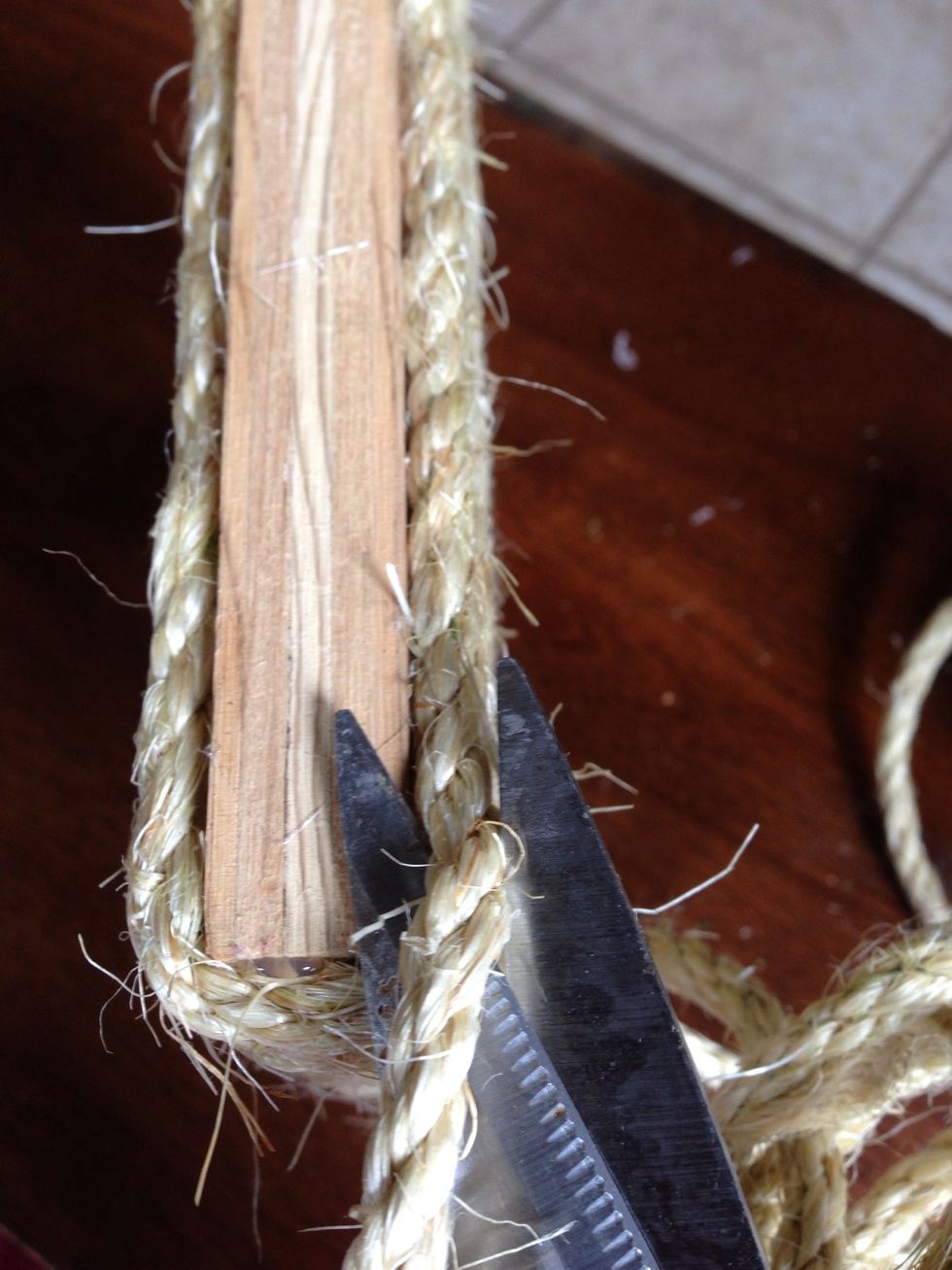 Trim the end off at an angle when you're done. The key is to avoid pieces of rope sticking out.